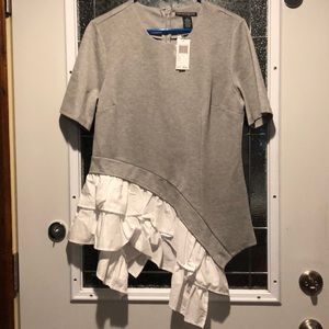 Asymetrical fitted tunic with ruffle detail